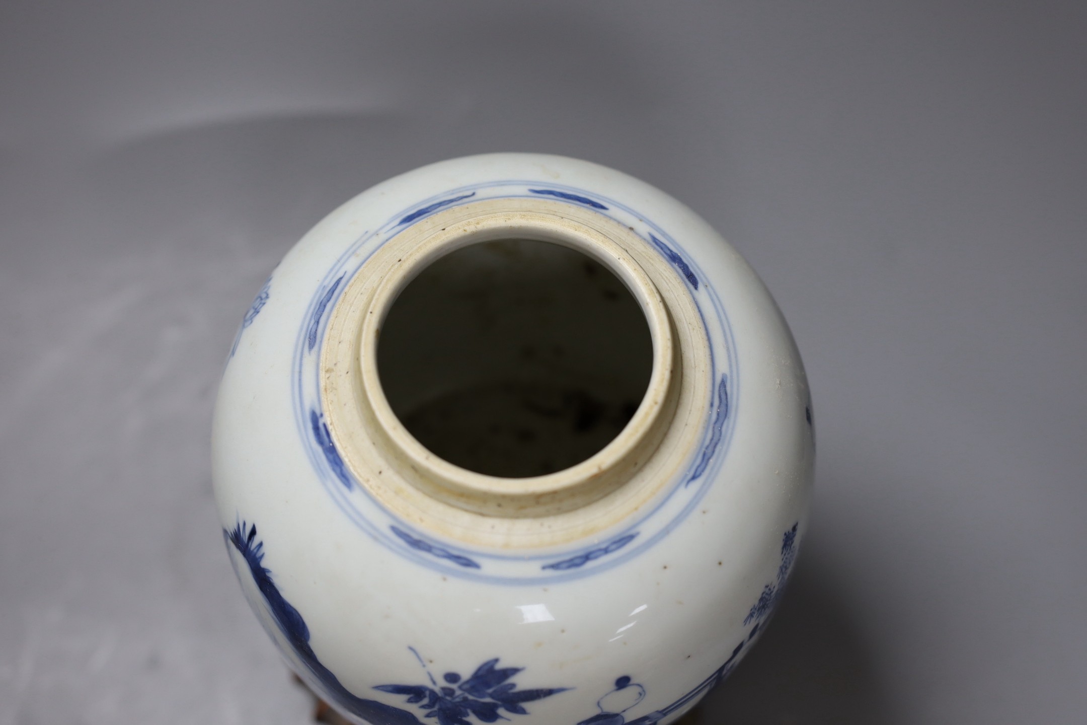 A Chinese blue and white 'boys' jar, 19th century, wood cover and stand, total height 24cm high